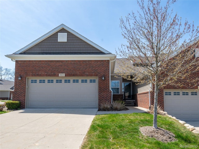 3021 Berkshire Rd, Auburn Hills, MI 48326 - view of front facade with brick siding and driveway
