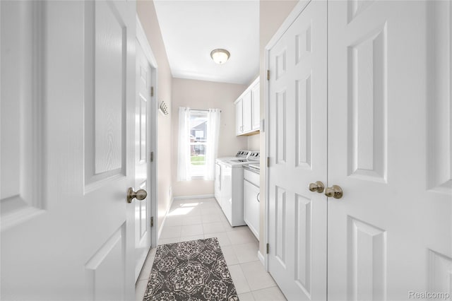 3021 Berkshire Rd, Auburn Hills, MI 48326 - washroom with washer and dryer, light tile patterned floors, cabinet space, and baseboards