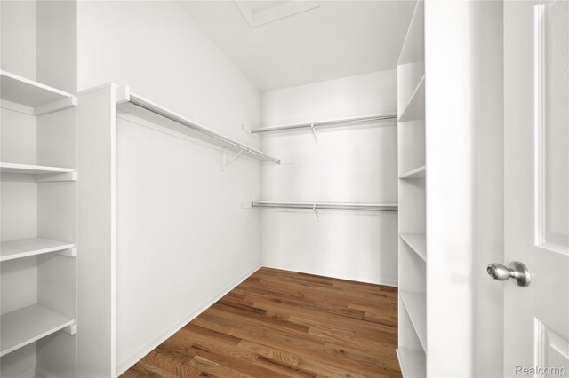 3021 Berkshire Rd, Auburn Hills, MI 48326 - spacious closet with wood finished floors
