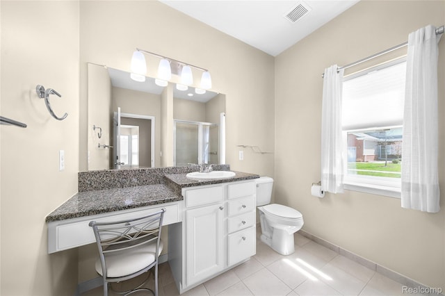 3021 Berkshire Rd, Auburn Hills, MI 48326 - full bathroom featuring vanity, a stall shower, baseboards, toilet, and tile patterned flooring