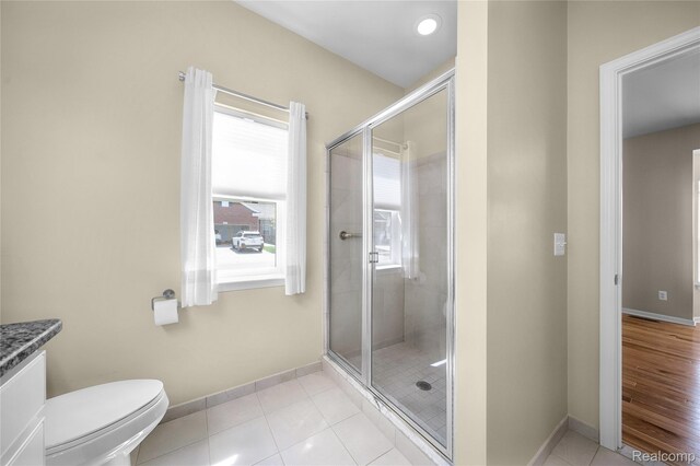 3021 Berkshire Rd, Auburn Hills, MI 48326 - full bath featuring baseboards, a shower stall, toilet, and vanity