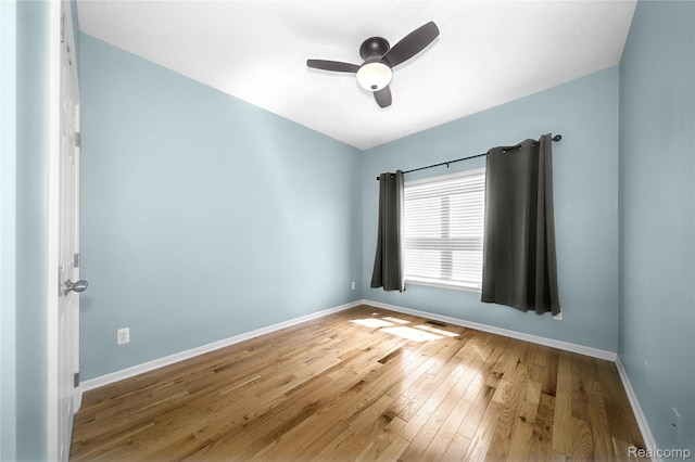 3021 Berkshire Rd, Auburn Hills, MI 48326 - spare room featuring baseboards, wood finished floors, and ceiling fan