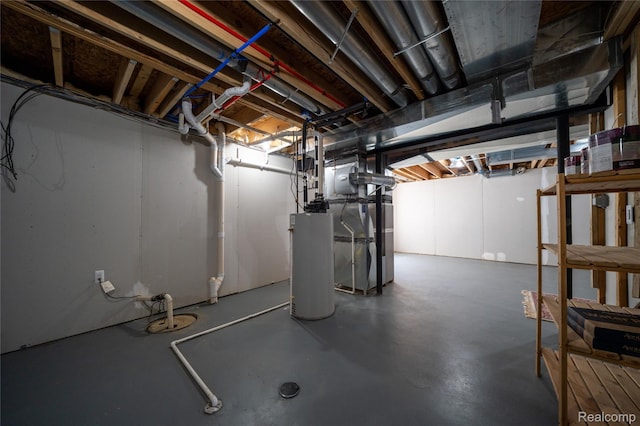 3021 Berkshire Rd, Auburn Hills, MI 48326 - unfinished basement with gas water heater and heating unit