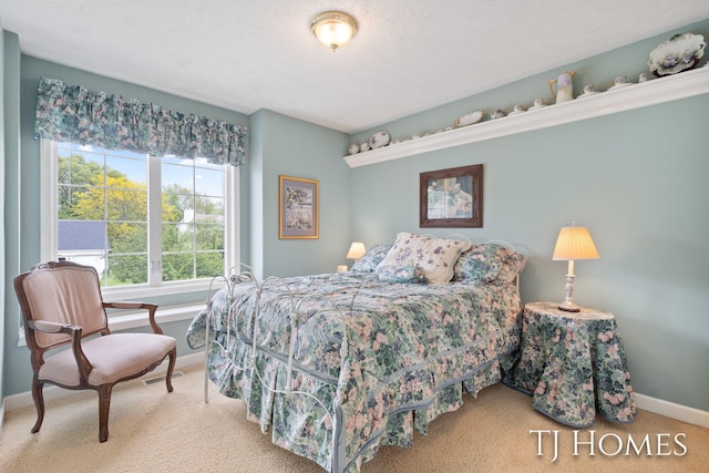 5348 Cristo Dr NE, Rockford, MI 49341 - bedroom with carpet floors and baseboards