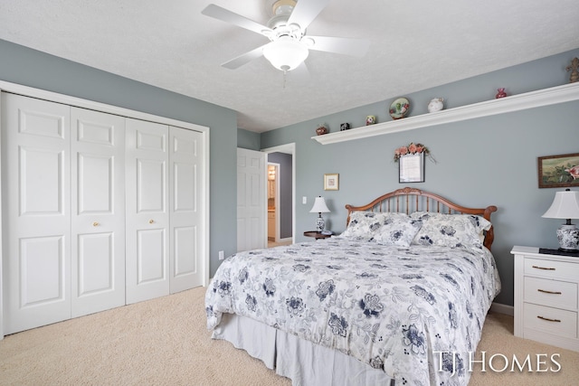 5348 Cristo Dr NE, Rockford, MI 49341 - bedroom featuring carpet flooring, a closet, and a ceiling fan