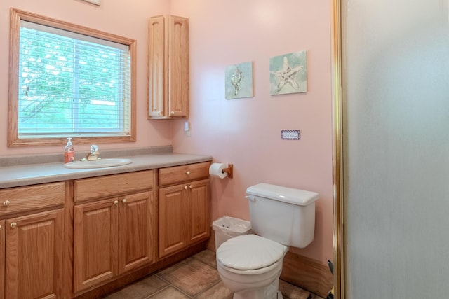 10138 S Lakeside Ridge Rd, Baldwin, MI 49304 - bathroom featuring toilet, vanity, and a shower