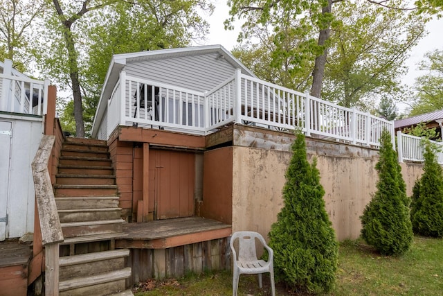 10138 S Lakeside Ridge Rd, Baldwin, MI 49304 - rear view of property featuring stairs and a deck