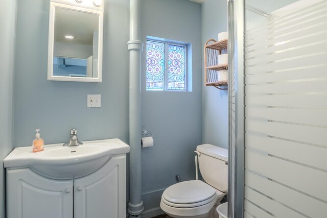 10138 S Lakeside Ridge Rd, Baldwin, MI 49304 - bathroom featuring toilet and vanity