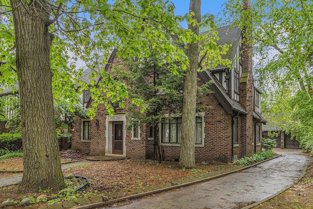 3261 Sherbourne Rd, Detroit, MI 48221 - tudor house with brick siding