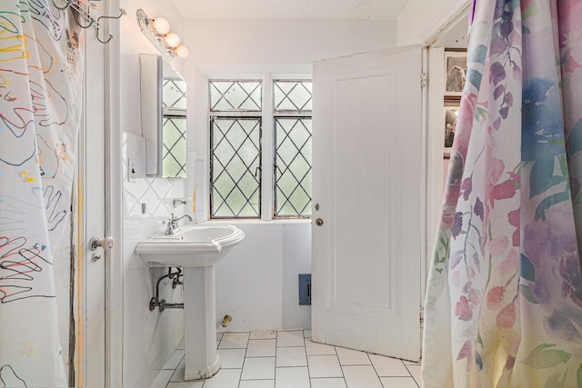 3261 Sherbourne Rd, Detroit, MI 48221 - bathroom featuring tile patterned flooring and a sink
