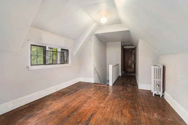 3261 Sherbourne Rd, Detroit, MI 48221 - additional living space featuring radiator heating unit, hardwood / wood-style floors, lofted ceiling, baseboards, and radiator