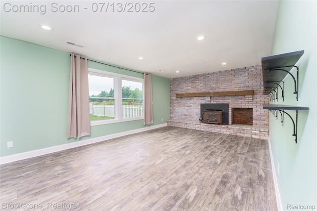 6245 Ray Rd, Swartz Creek, MI 48473 - unfurnished living room featuring wood finished floors and recessed lighting