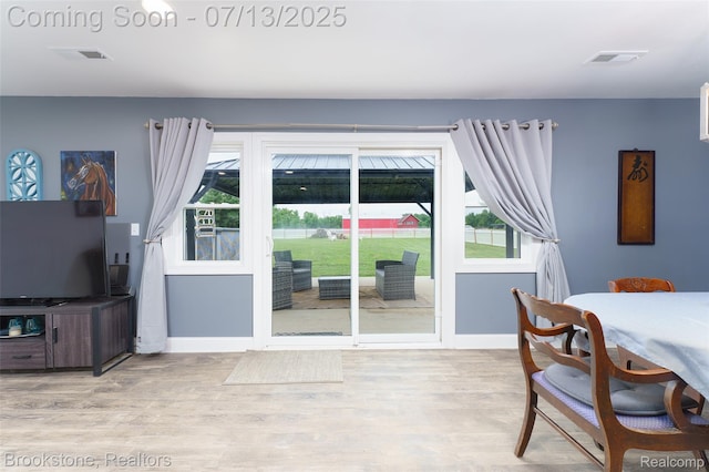 6245 Ray Rd, Swartz Creek, MI 48473 - dining space with wood finished floors