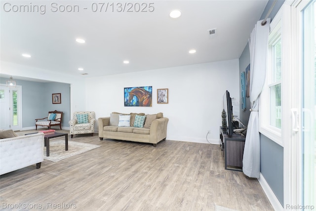 6245 Ray Rd, Swartz Creek, MI 48473 - living room featuring recessed lighting and light wood finished floors