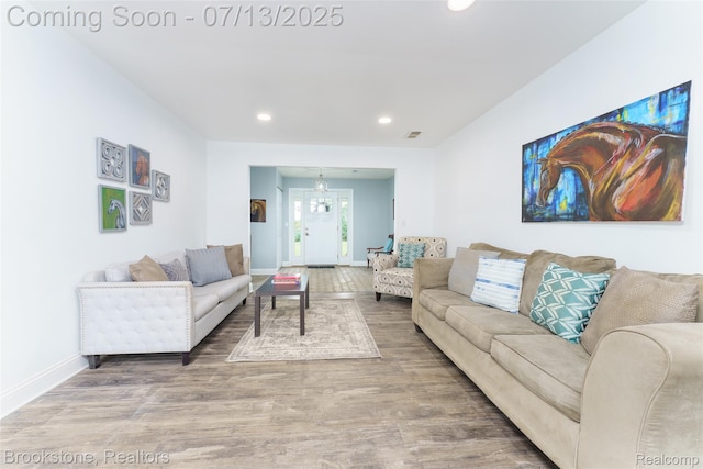 6245 Ray Rd, Swartz Creek, MI 48473 - living area with recessed lighting and wood finished floors