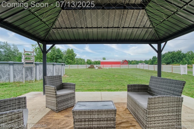 6245 Ray Rd, Swartz Creek, MI 48473 - fenced backyard with a patio and a gazebo