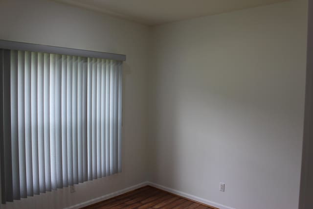 151 Ernest St, Brooklyn, MI 49230 - unfurnished room with baseboards and wood finished floors