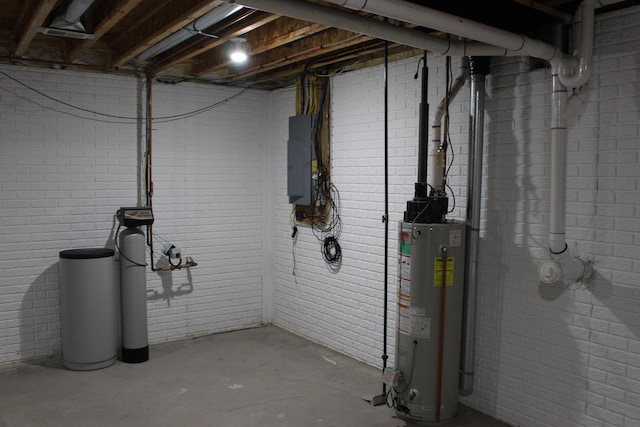 151 Ernest St, Brooklyn, MI 49230 - unfinished basement with water heater, a water softener system, brick wall, and electric panel