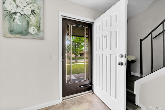 39321 Faith Dr, Sterling Heights, MI 48310 - tiled foyer entrance with baseboards
