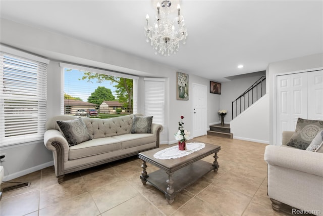 39321 Faith Dr, Sterling Heights, MI 48310 - living area with stairs, baseboards, light tile patterned flooring, recessed lighting, and a chandelier