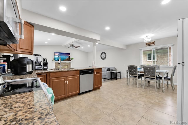 39321 Faith Dr, Sterling Heights, MI 48310 - kitchen with stainless steel dishwasher, a sink, a peninsula, open floor plan, and light tile patterned flooring