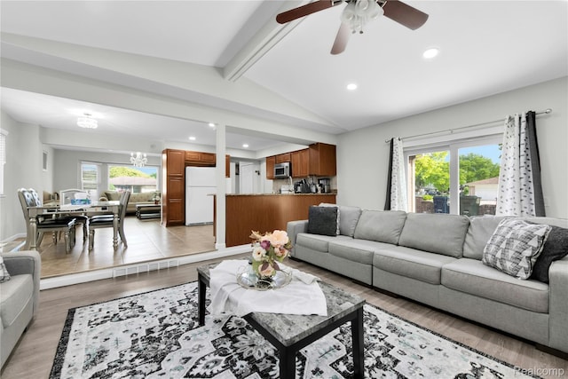 39321 Faith Dr, Sterling Heights, MI 48310 - living room with recessed lighting, light wood finished floors, ceiling fan, and a chandelier