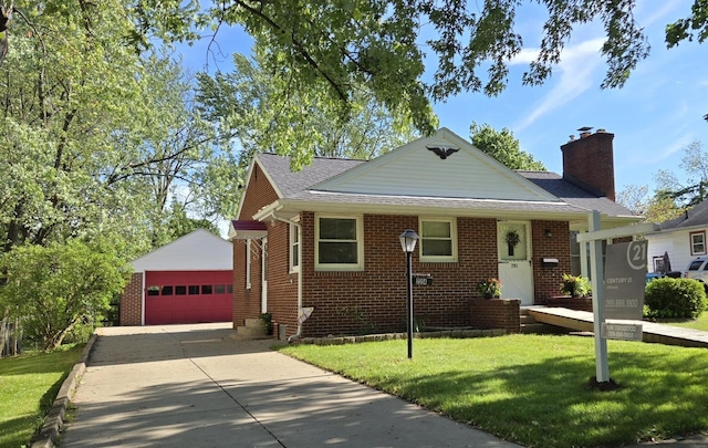 2204 Lakeway Ave, Kalamazoo, MI 49001 - bungalow-style home featuring an outbuilding, a garage, brick siding, a front yard, and a chimney