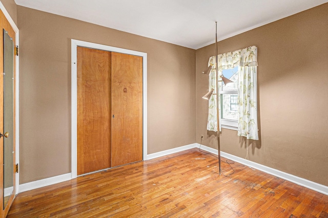 2204 Lakeway Ave, Kalamazoo, MI 49001 - unfurnished dining area with wood finished floors and baseboards