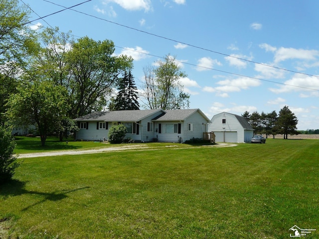 12067 Lewis Ave, Temperance, MI 48182 - ranch-style house featuring a garage, a front lawn, an outbuilding, and driveway