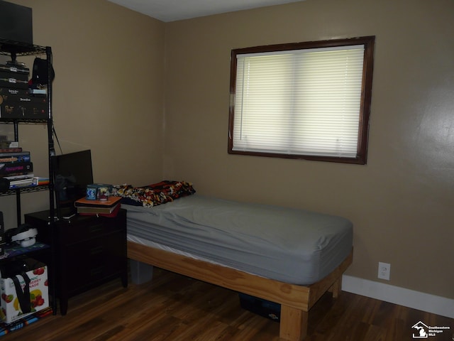 12067 Lewis Ave, Temperance, MI 48182 - bedroom with wood finished floors and baseboards