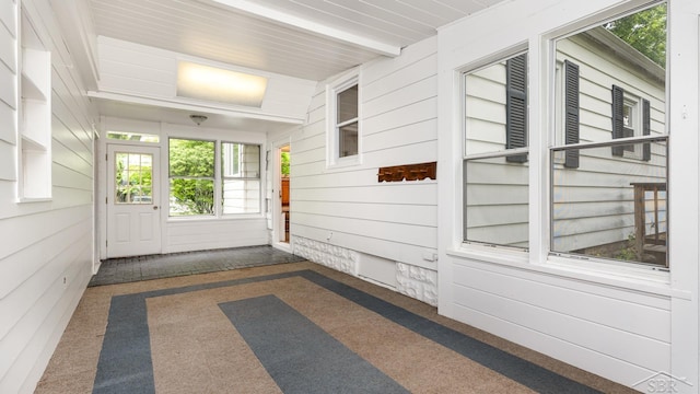 1355 Hemmeter Rd, Saginaw, MI 48638 - unfurnished sunroom featuring beam ceiling