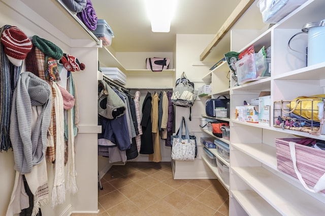 3638 Bellflower Dr, Portage, MI 49024 - spacious closet featuring light tile patterned floors