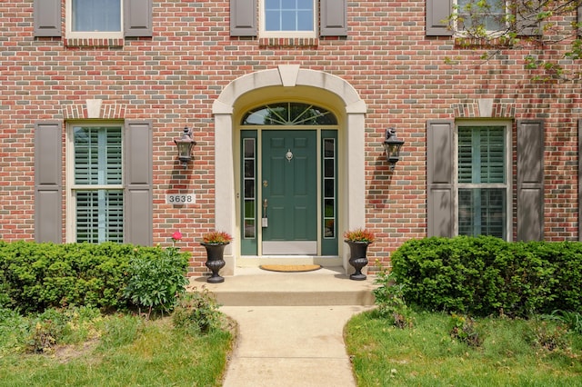 3638 Bellflower Dr, Portage, MI 49024 - view of exterior entry featuring brick siding