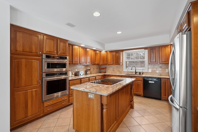 3638 Bellflower Dr, Portage, MI 49024 - kitchen featuring stainless steel appliances, a sink, light tile patterned floors, decorative backsplash, and recessed lighting