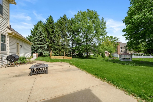 3638 Bellflower Dr, Portage, MI 49024 - view of patio with a fire pit, area for grilling, and ac unit