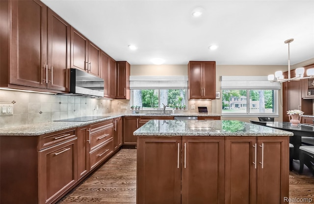 5259 Echo Rd, Bloomfield Hills, MI 48302 - kitchen featuring stainless steel microwave, dark wood-type flooring, a sink, a center island, and recessed lighting