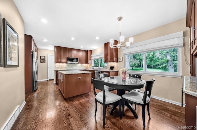 5259 Echo Rd, Bloomfield Hills, MI 48302 - dining room featuring a chandelier, dark wood-type flooring, baseboards, and recessed lighting