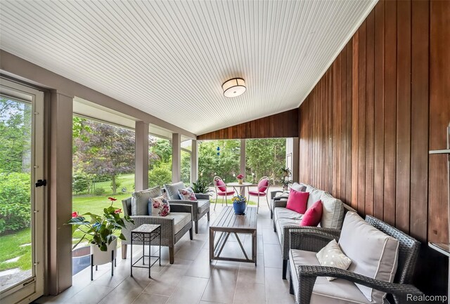 5259 Echo Rd, Bloomfield Hills, MI 48302 - sunroom with outdoor lounge area and lofted ceiling