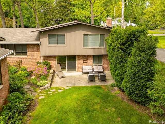 5259 Echo Rd, Bloomfield Hills, MI 48302 - rear view of property with an outdoor hangout area, a patio, a lawn, brick siding, and a chimney