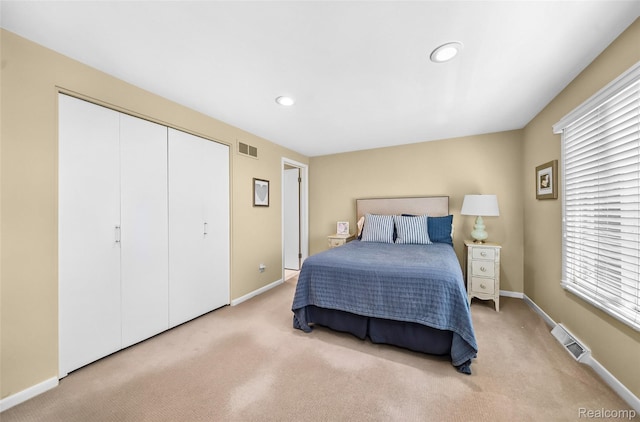5259 Echo Rd, Bloomfield Hills, MI 48302 - carpeted bedroom with baseboards, multiple windows, a closet, and recessed lighting