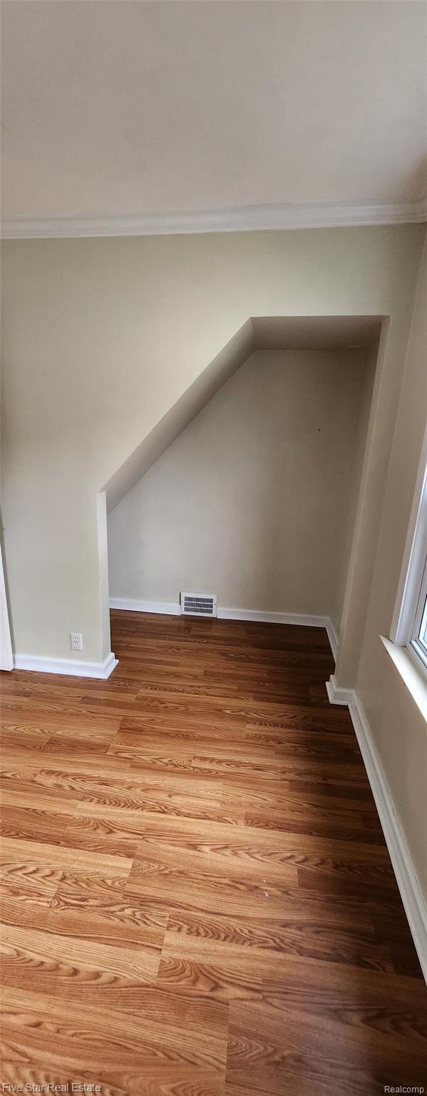 20120 Rensellor St, Livonia, MI 48152 - additional living space with light wood-style floors and baseboards