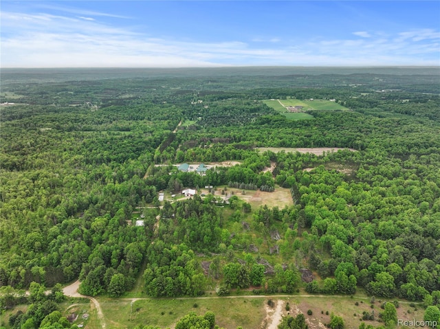 8875 N Lakola Rd, Tustin, MI 49688 - drone / aerial view of a heavily wooded area