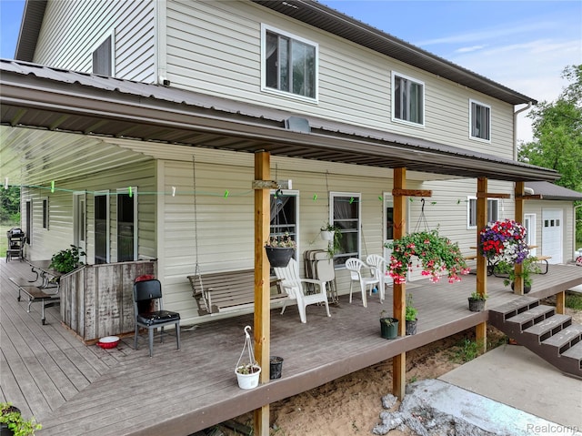 8875 N Lakola Rd, Tustin, MI 49688 - view of wooden terrace