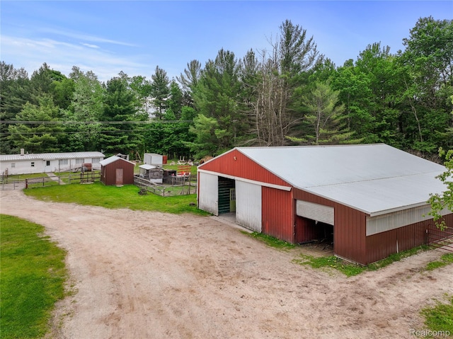 8875 N Lakola Rd, Tustin, MI 49688 - view of pole building