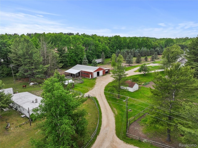 8875 N Lakola Rd, Tustin, MI 49688 - view from above of property with a heavily wooded area