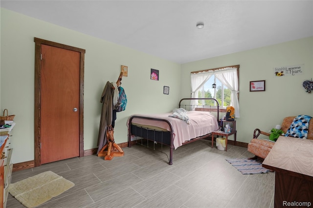 8875 N Lakola Rd, Tustin, MI 49688 - bedroom with baseboards