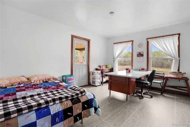 8875 N Lakola Rd, Tustin, MI 49688 - bedroom with an office area