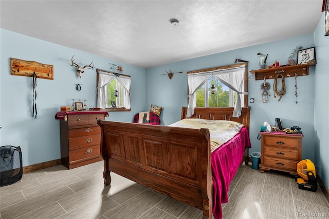 8875 N Lakola Rd, Tustin, MI 49688 - bedroom with baseboards