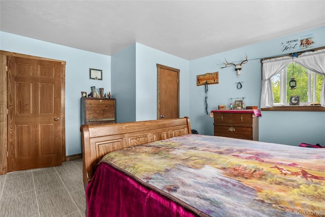 8875 N Lakola Rd, Tustin, MI 49688 - view of bedroom
