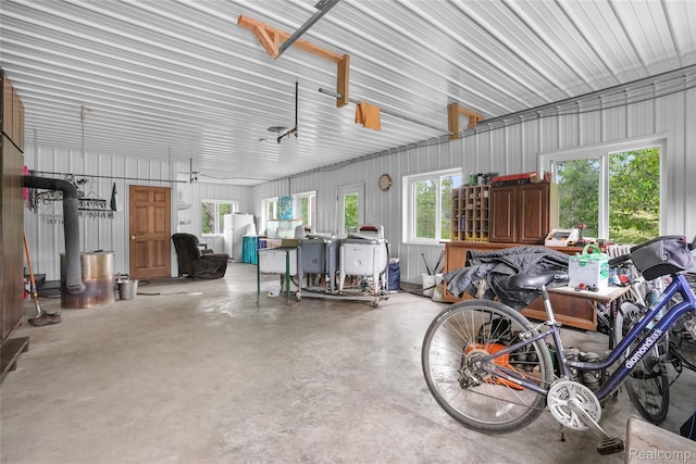 8875 N Lakola Rd, Tustin, MI 49688 - garage with metal wall